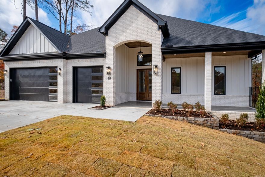 10 Abington Court in Chenal Valley is a stunning new construction featuring all the amenities one would expect to find in a luxury home. The Primary Bedroom and three additional Bedrooms with Ensuite Baths on the Main Level. Entertain with ease in the spacious open living area.  The Great Room’s focal point is the gas fireplace flanked by floating shelves and built-in cabinets, the gourmet kitchen boasts beautiful cabinetry, some lighted with glass doors and the full-size dining space boasts a fabulous chandelier.  All looking out to a large, covered patio with fireplace and a private, fully fenced back yard.  There is also an additional Bedroom and full Bath upstairs making this a 5 Bedroom, 5 Bathroom home adorned with a beautiful color pallet of natural whites and neutral tones throughout.  Located in Abington Court, one of Chenal Valley’s newest neighborhoods, beautifully developed with natural scenery and walkable streets. In addition, it offers convenient access to Cantrell Road (Highway 10) and Chenal Parkway.