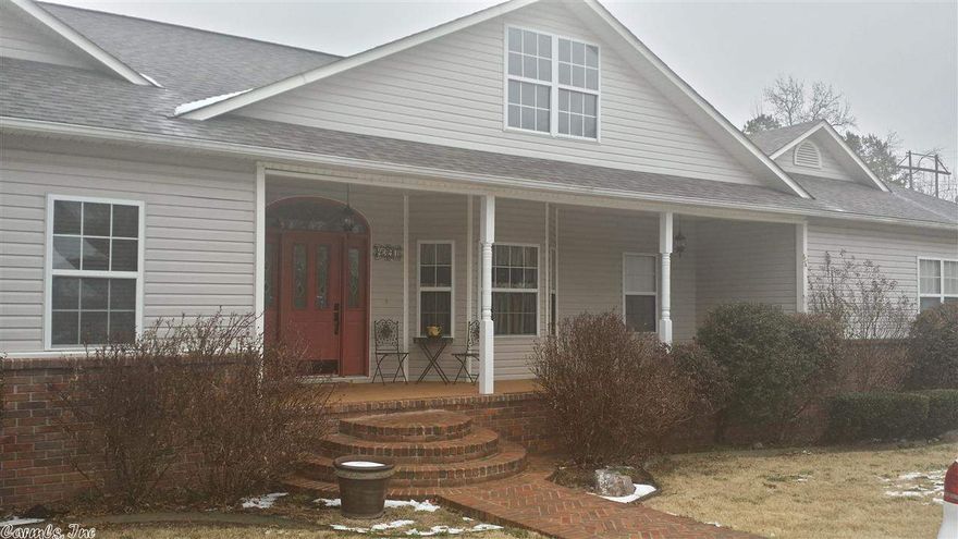 This is a great looking, custom-built 3 (or 4) br/2.5 bath, well-constructed house with a 3 car garage, sun room, and tons of storage. It is 5 minutes from town, but peaceful and quiet. All of the rooms are very spacious with lots of cabinet and closet storage everywhere. The foyer, dining room, and the open, well-lit kitchen have lovely hardwood floors. A spacious office can be used as a 4th  bedroom. Large detached shop with extra storage is an added bonus. Too many amenities to list. **AGENTS SEE REMARKS