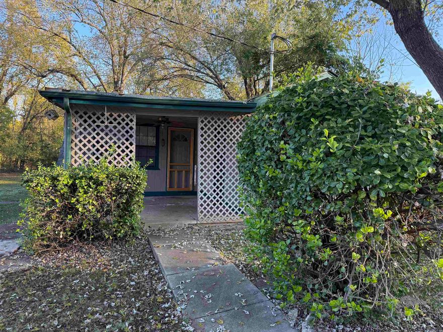 Excellent opportunity for an investor or first-time home buyer! This charming 2-bedroom, 1-bath home features a partial basement, a covered front porch, and a huge detached 2-car garage with an attached carport. Plenty of space for storage, parking, or a workshop, all while offering cozy charm and great potential!