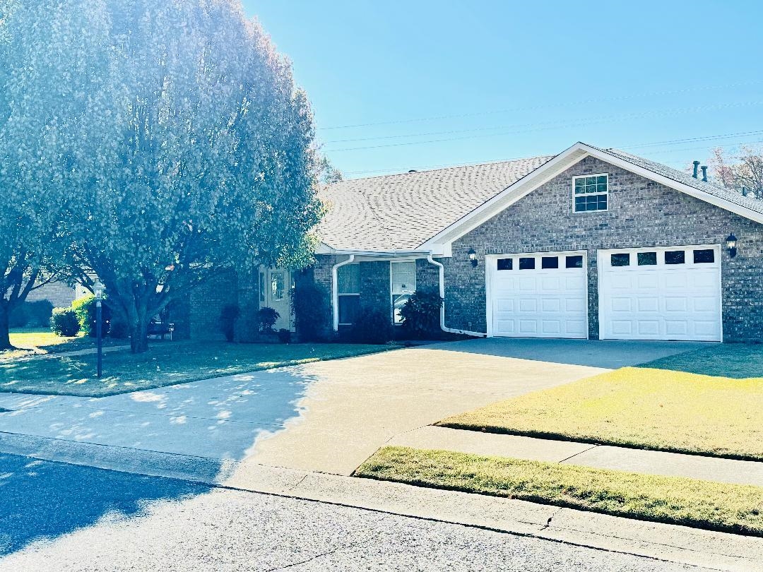 This lovely 3 Bedroom 2 Bath Brick Home has so much to offer and is very convenient to Hospitals, Restaurants shopping and Sams Club!! The Exterior is maintenance free and has a fenced in back yard and a covered patio great for family get together and cook outs!! Also, it has a master gardeners rose garden, and a storage shed for all your garden tools!! This home has been very well taken care of and has so many great things to offer and has been built for convenience! The living room is huge with cathedral ceilings and a large cozy fireplace with a hearth to enjoy the warmth!! The kitchen is great for a chef with all the Beautiful Oak cabinets and pull outs for cooking convenience. There are 2 pantries both with pull outs also! It also has a kitchen nook and a breakfast bar. It also has a large nice formal dinning room for all your guests! The home has neutral pant colors. The Bedrooms have nice wood flooring , walk-in closets, ceiling fans nice windows and are very spacious! The master bedroom with huge walk-in closet also has a master bath with walk-in shower , and a nice jacuzzi tub and huge window with lovely outdoor lighting! Also off the master bath is a laundry.