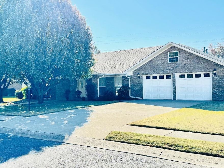 This lovely 3 Bedroom 2 Bath Brick Home has so much to offer and is very convenient to Hospitals, Restaurants shopping and Sams Club!! The Exterior is maintenance free and has a fenced in back yard and a covered patio great for family get together and cook outs!! Also, it has a master gardeners rose garden, and a storage shed for all your garden tools!!  This home has been very well taken care of and has so many great things to offer and has been built for convenience!  The living room is huge with cathedral ceilings and a large cozy fireplace with a hearth to enjoy the warmth!!  The kitchen is great for a chef with all the Beautiful Oak cabinets and pull outs for cooking convenience. There are 2 pantries both with pull outs also! It also has a kitchen nook and a breakfast bar. It also has a large nice formal dinning room for all your guests! The home has neutral pant colors. The Bedrooms have nice wood flooring , walk-in closets, ceiling fans nice windows and are very spacious!  The master bedroom with huge walk-in closet also has a master bath with walk-in shower , and a nice jacuzzi tub and huge window with lovely outdoor lighting!  Also off the master bath is a laundry.