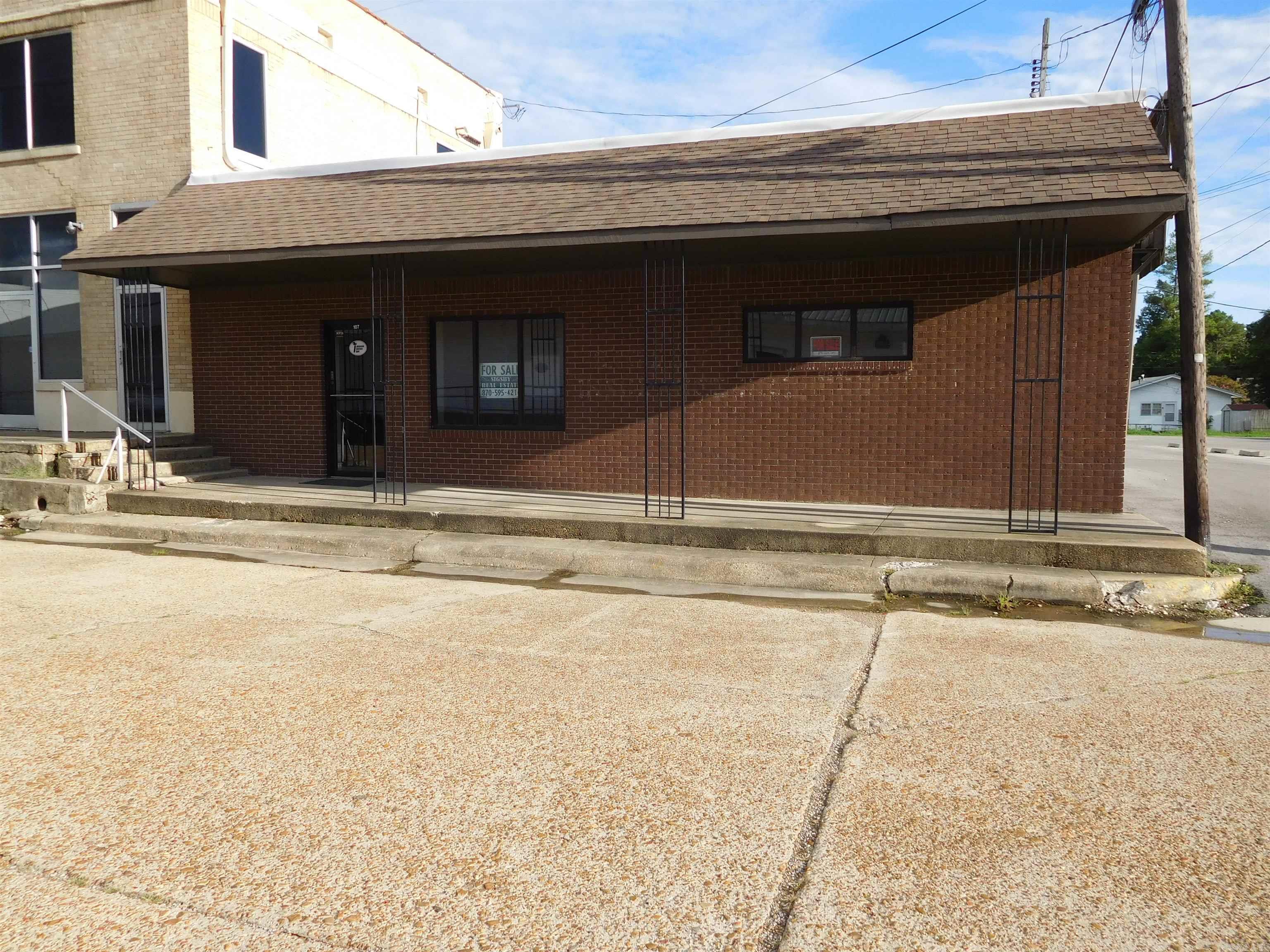 Recently remodeled. Two private offices. Two work stations. Receptionist and waiting area. Conference room. Two restrooms. Adjacent to city parking lot.