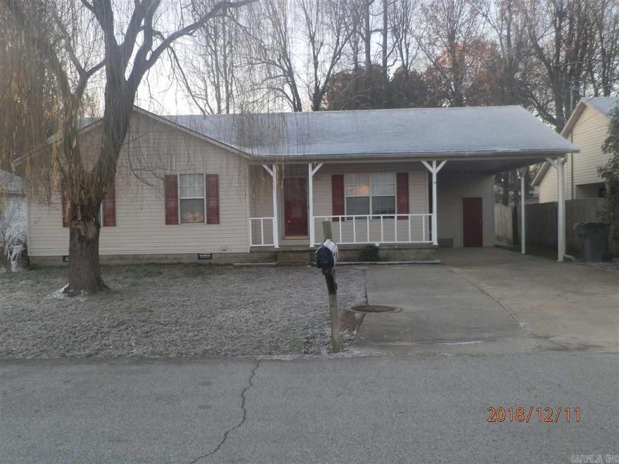 This rental features decent-sized bedrooms, large eat-in kitchen and separate laundry room. Backyard is fenced and has a storage building. There is an additional storage room off the one-car carport. Owner furnishes range, refrigerator, dishwasher, washer and dryer. Tenant is responsible for all utilities and maintaining the lawn and landscaping. Application required and application fee charged.