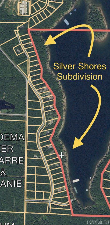 **Lake front lot**Restricted Subdivision with a minimum of 1500sq.ft. homes. Silver Shores Subdivision has a number of newer upscale homes already built on the lake. Community concrete boat ramp in Silver Shores Subdivision & Tannenbaum Golf Course just down the street. All underground utilites! No mobiles allowed.