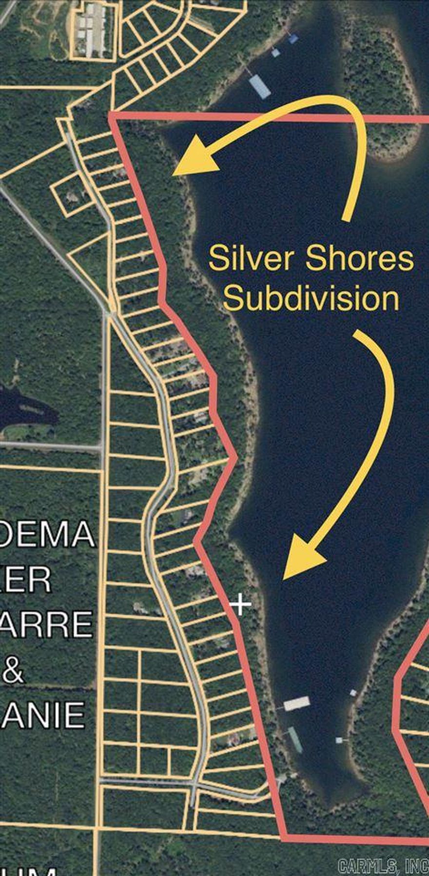 **Lake front lot**Restricted Subdivision with a minimum of 1500sq.ft. homes. Silver Shores Subdivision has a number of newer upscale homes already built on the lake. Community concrete boat ramp in Silver Shores Subdivision & Tannenbaum Golf Course just down the street.  All underground utilites! No mobiles allowed.