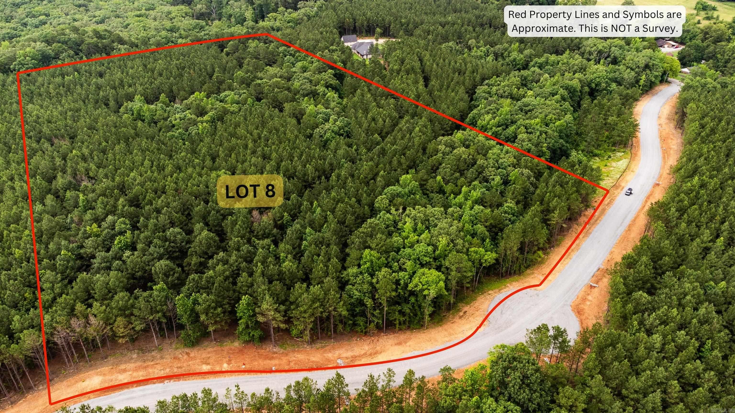 Discover the perfect canvas for your dream home on this stunning 20+ acre lot nestled within a small, private subdivision. Surrounded by rolling hills and scenic countryside, this expansive property offers both privacy and possibility. Whatever your vision, you'll find the space and freedom to make it your own. Conveniently located just 10 minutes from the I-30, close to schools, shopping, and everyday essentials—yet only 35 minutes from the charm and relaxation of Bathhouse Row in Hot Springs. Don’t miss your chance to own a slice of Arkansas paradise.