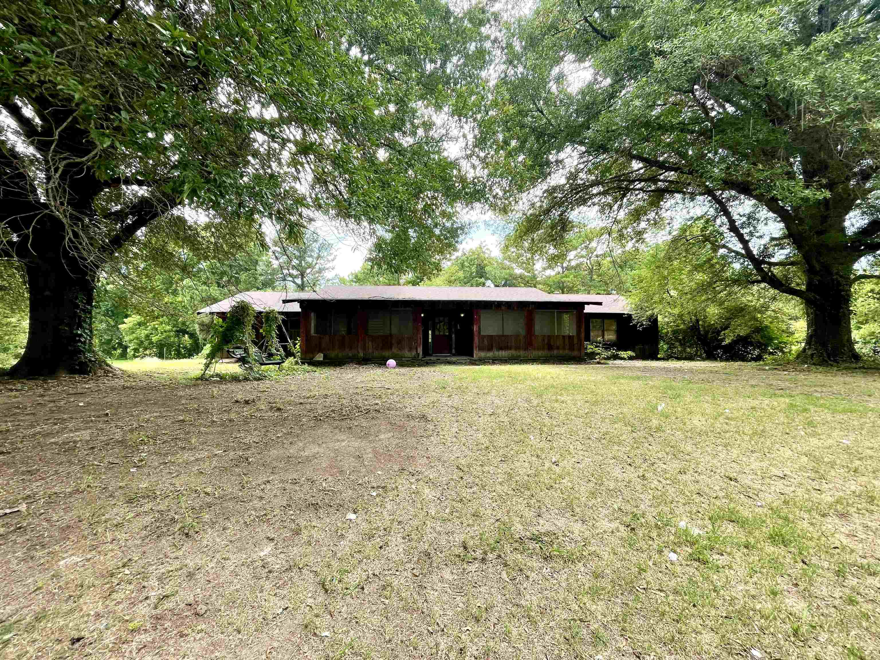 This unique property in Lepanto is what you've been waiting for! This home is over 2,500 sq. ft. on 1.4 acres near the Little River. It has all the rustic charm inside with beautiful wood ceiling details, wood beams, and stonework in the living room. The kitchen cabinets, interior doors, and trim work are all solid wood and custom as well. The living room is very large with a stone, wood burning fireplace insert with blowers. This home also offers 3 bedrooms, 2 baths, a spacious laundry room, a covered patio, and a covered front porch that could easily be fully enclosed if desired. The front yard is large with Call your favorite REALTORĀ® and schedule your private showing!