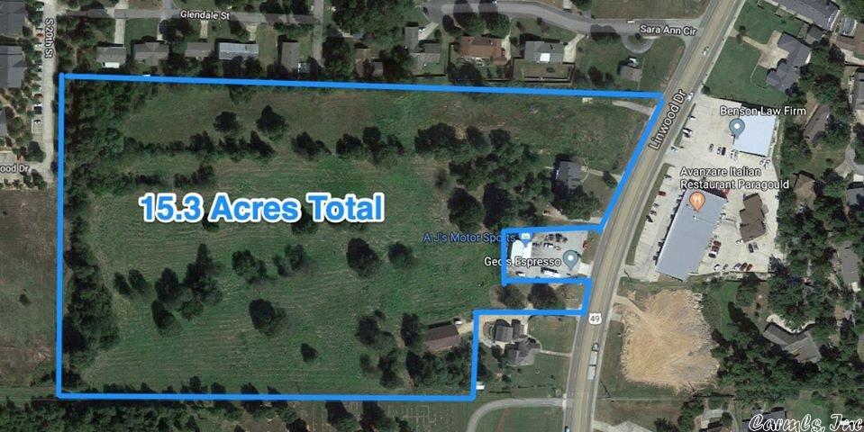 PRICED BELOW APPRAISAL: 15.3 acres of land in the heart of Paragould on hwy49 close to the 412 west corridor (1008-1010 Linwood Dr). This property has been cleared. Owners would lot split/or build to suit. Rezoning was filed in Nov 2018 making the front c3 over 5 acres and the back r4 over 9 acres of c3 commercial property, plans for a patio home subdivision, condos, or commercial property could be split off for sale. There are 3 entries off hwy 49s, one off Barnhill Rd, and on McKenzie Drive as well.