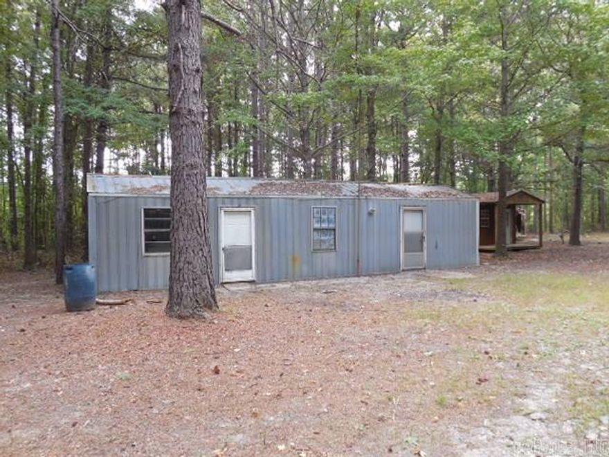 Deer camp or future homesite. ****Building next to gray building does not convey****