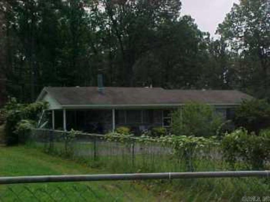 Great home located outside of town. Needs updates throughout.