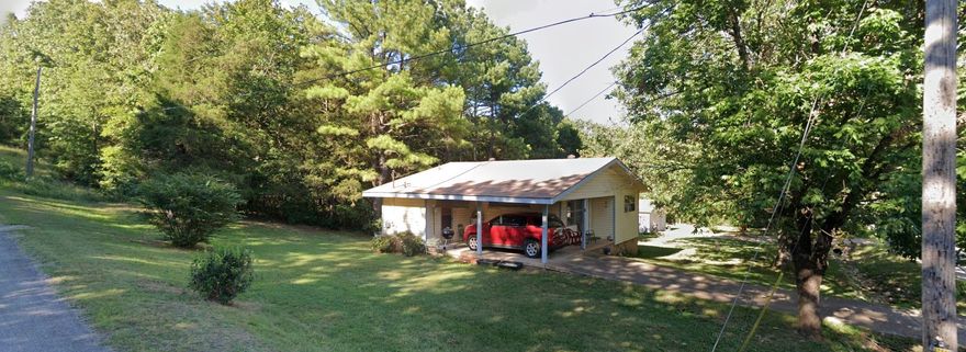 Cute Rental! This two-bedroom, full bath cottage on Moonbeam Trail has a detached 1-car garage and a carport. Sits on corner lot.