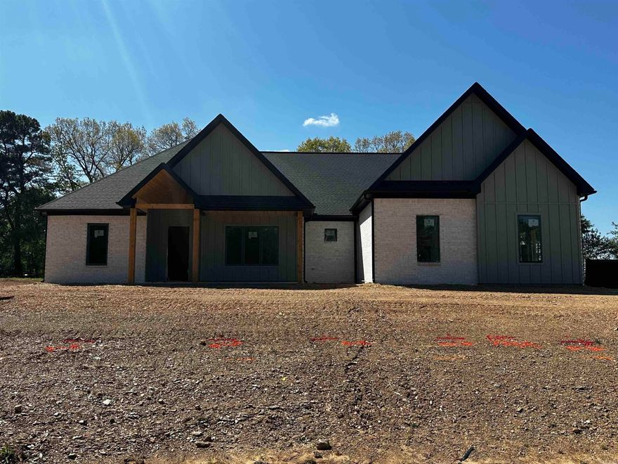 Experience the perfect blend of space, style, and functionality in this stunning new construction home situated on a full acre lot. Offering 4 bedrooms, 3.5 bathrooms, and a thoughtfully designed layout, this home is ideal for everyday living and entertaining alike.  The heart of the home features a spacious kitchen with quartz countertops, gas appliances, and a large walk-in pantry ready to keep everything organized. Just off the entry, you'll find a dedicated office space—perfect for working from home or creating a quiet retreat.  The private primary suite is generously sized and designed for comfort, complete with a luxurious bath featuring split vanities, a dedicated makeup counter, soaking tub, pass-through shower, and an oversized walk-in closet that conveniently connects to the laundry room. Two additional bedrooms and a full bath are located downstairs, while the upstairs bonus room with its own bath can easily serve as a 4th bedroom, guest suite, or flex space.  Set on a beautiful one-acre homesite, this property offers room to breathe while still delivering modern finishes and timeless design. Estimated completion is the end of June—secure it now and make it yours!