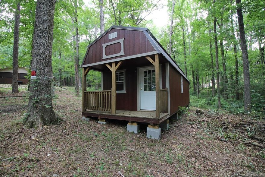Turn this empty tiny home into your very own quite escape sitting on .53 of an acre in LSSD. across from Lake Catherine.