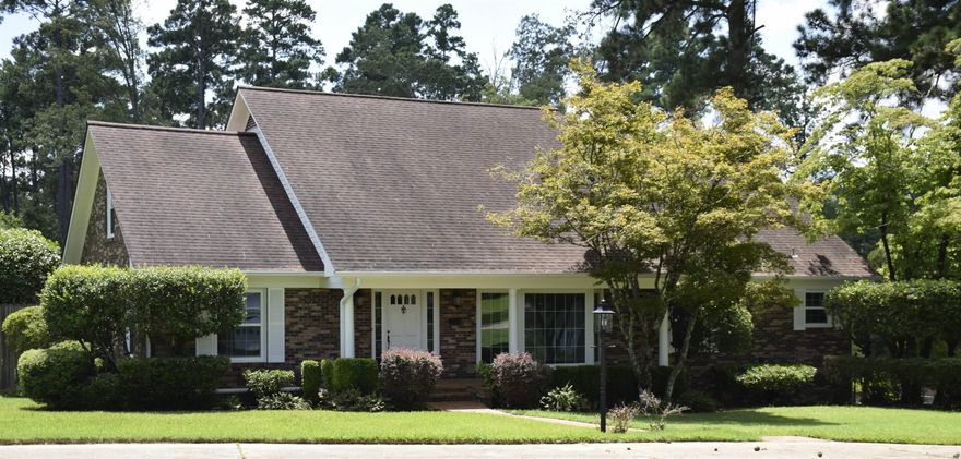 Beautiful updated custom built home located in the View Hills Subdivision.  With approximately 3,969 square feet, this home is much bigger than it looks from the street.  Built in 1968 with storage and hosting in mind, this home underwent an extensive renovation in the last year.  The home features brand new hardwood floors, new marble and quartz countertops, custom built cabinets, new windows, new carpet, new light fixtures, and a neutral color scheme throughout the house.  The home features three levels with a large basement under the house for two cars and storage.  The main level has an open concept throughout with a large family room and newly renovated kitchen with all new appliances including a gas range, dishwasher, refrigerator, and a farm sink with a disposal.  With the primary bedroom on the main floor, this home has four bedrooms with an optional fifth bedroom on the main level.  There are two and a half bathrooms on the main level with one bathroom upstairs. The storage areas in the house are abundant with three walk in attic rooms on the second floor.  The property includes almost 2 acres of a beautifully landscaped yard with a sprinkler system and a fenced backyard.