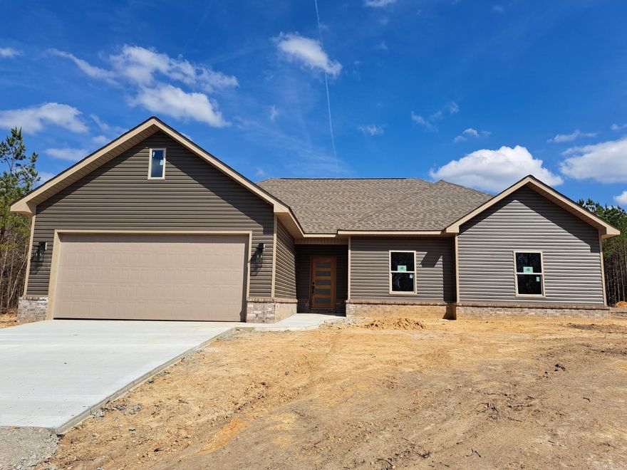 New Construction!  4Bedroom 2 full baths on 1 acre of land in Saline County.  Great access to almost everything in Benton/Bryant and Little Rock. Kitchen features ss appliances, upgraded dishwasher with 3rd rack, smooth top range, custom cabinets with all soft-close hardware, double trash pull-out, granite countertops, 10 ft peninsula with overhang for bar stool seating, a wood burning fireplace and 8x22 covered patio area located on a quiet dead in street