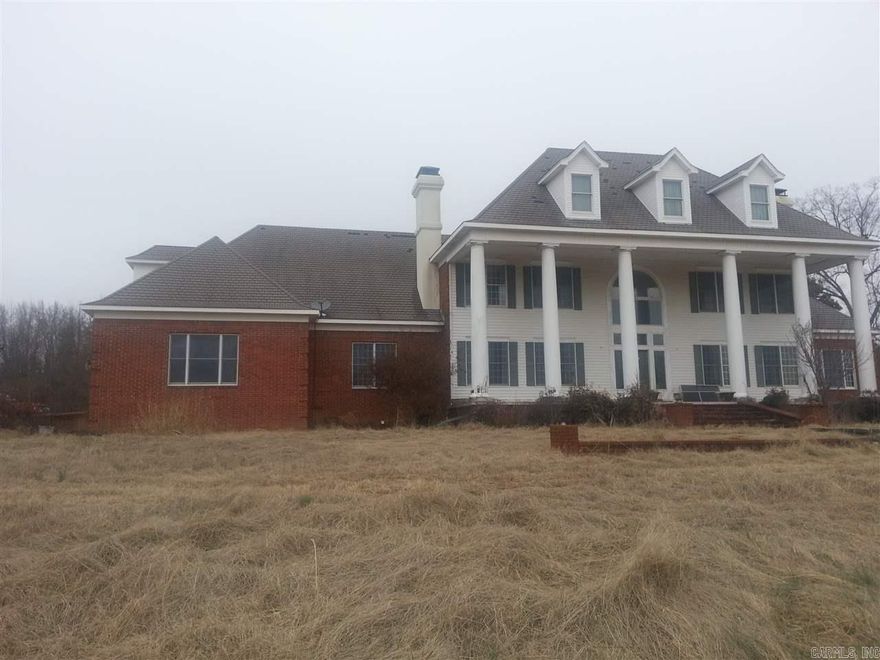 This home is a true fixer upper but has a LOT of space. Besides the bedrooms you have a huge room that was used for a craft room and another that was used for an office as well as a large library. The exterior has a very large detached 4 car garage with unfinished guest quarters for a total of space for 8 cars. THIS PROPERTY IS BEING WATCHED BY THE LONOKE COUNTY SHERIFFS OFFICE!!! DO NOT SHOW UP WITHOUT PRIOR APPROVAL FROM LISTING AGENT!! SEE AGENT & SHOWING REMARKS!!