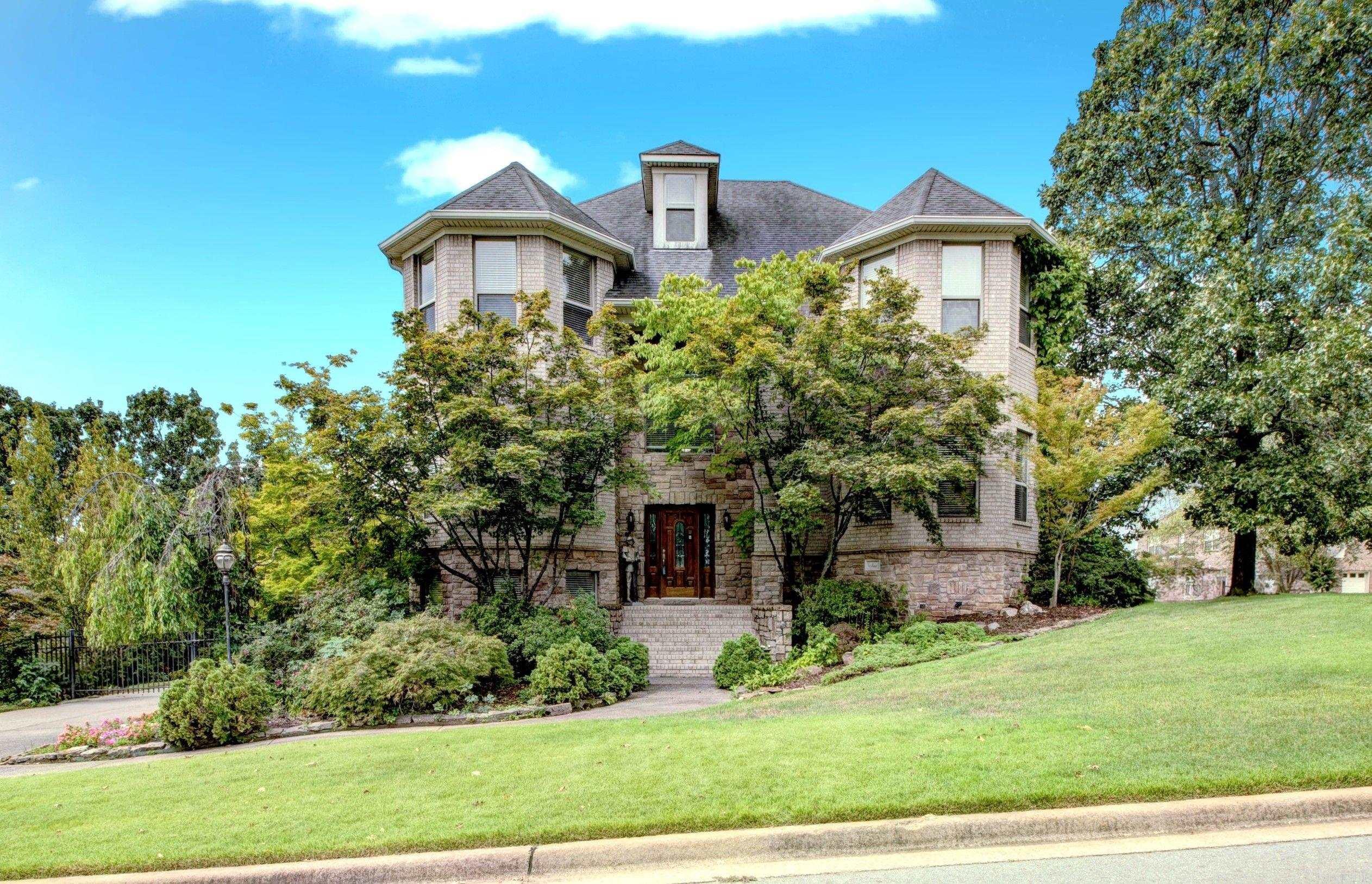 British Castle feeling, stunning entrance, this 3-story corner lot home has all the space and convenience you'll need, plus Arkansas River view. One owner, custom built, 5 bedrooms, 3 1/2 baths, with 3 of the beds having their own bath. Large kitchen with tall breakfast bar, new wall oven and an Avantium mw above it, new trash compactor, new dishwasher, two-sided fireplace, two back terraces with beautiful views! Primary bedroom is huge, has a kitchenette. The primary bath is very large as well. New LVP flooring on main level and downstairs. Marble countertops in laundry room and both guest baths on main level, new cabinets in one guest bath. New low E windows in living room. Two new AC units in 2022. Whole house generator, koi pond, lots of storage under the house and room off the garage. New hot tub. Extensive landscaping and sprinkle system. Central vacuum system throughout the house plus in the garage for the cars. Primary bd. freshly painted, all carpets upstairs professionally cleaned. Main level deck has a special membrane with a 10 yrs warranty. Make this one yours, you won't regret it! Agent see remarks please!