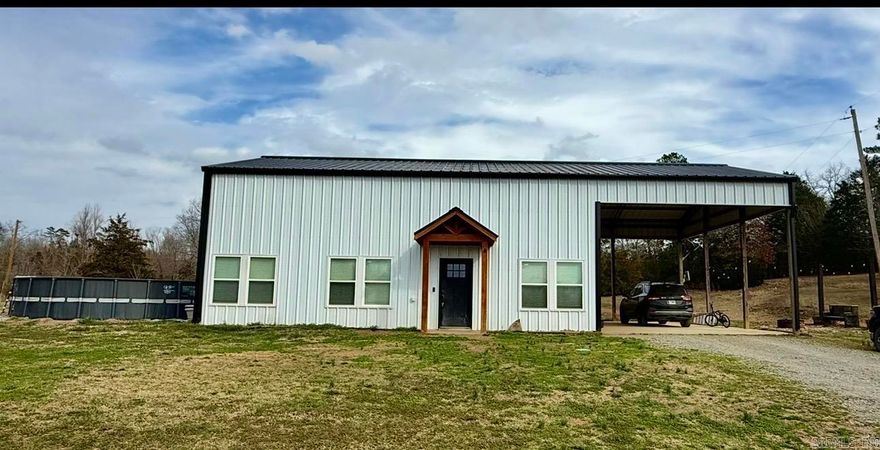 Nestled on 9.62 beautiful acres, this charming 3 bedroom, 1 bath home offer privacy, functionality and room to roam.  the fully fenced property features a secure electric gated entrance, barbed wire perimeter fencing and a wood plank fence enclosing the back yard.  Inside, you'll find a mix of vinyl plank and concrete flooring throughout main floor and carpeted stairs and loft area.  The spacious loft offers flexible space, perfect for a home office, playroom or additional storage space.  The Kitchen showcases a stylish blend of granite and butcher block countertops, and all appliances convey- including washer and dryer.  some personal property may also convey with acceptable offer.  Outdoors, enjoy a peaceful pond, small storage shed, fruit trees scattered throughout the property and newly planted maple trees along the driveway.  A playhouse and trampoline are included as well.  This property offers the perfect blend of country living with practical amenities already in place.  Property is partially in Bismarck school district and partially in Malvern school district.  34 minute drive the Oaklawn Racing and Casino Resort.  Agents see Agent Remarks