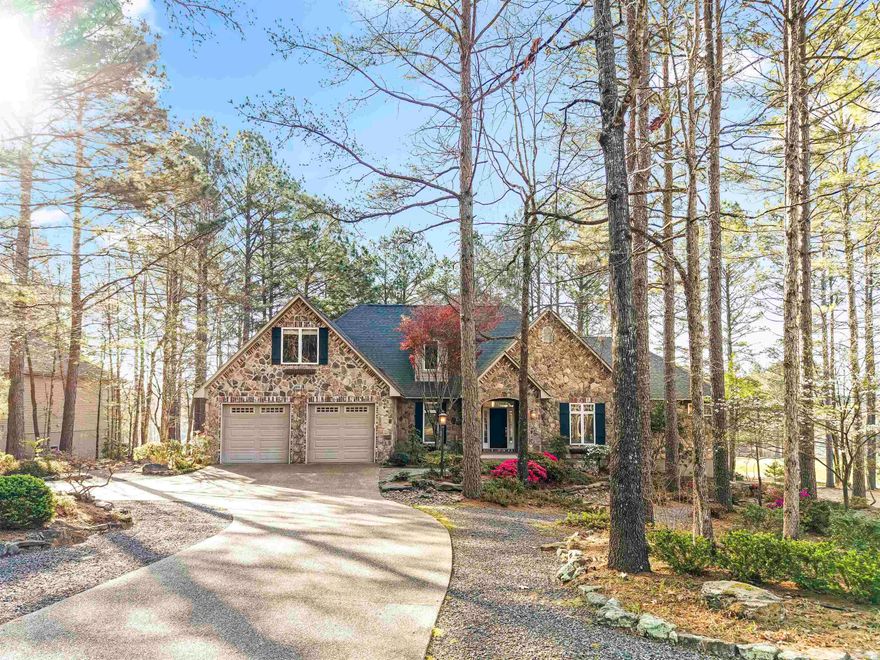 Golf Course Elegance at 32 Innovacion Lane Discover 32 Innovacion Lane, a 2,654 sq. ft. masterpiece defined by a stunning stone and vinyl exterior. The home’s curb appeal is unmatched, featuring a striking entryway and extensive grounds meticulously designed by a custom landscape architect. An oversized flat driveway provides a rare abundance of extra parking for guests.  The main level features vaulted ceilings and new wood flooring. Designed for effortless living, the primary suite and an executive office with custom cabinetry are both conveniently located on the main floor. The kitchen is an entertainer's dream with a wine fridge and breakfast bar, while the laundry room offers a utility sink and extra storage. Upstairs, you’ll find three guest bedrooms and a full bath.  The outdoor living spaces are second to none, with a covered porch and an uncovered deck with TimberTech decking offering a premium view of the green at Isabella Golf Course, #1 Santa Maria. For the hobbyist, there is an oversized garage with workshop space, plus a lower-level golf cart garage and massive under-deck storage. A truly refined home where every detail has been carefully considered.