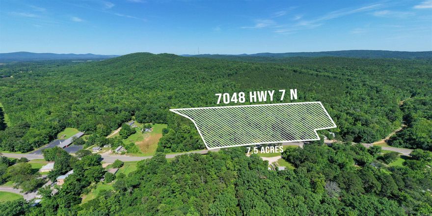 Wooded and Serene! 6 acres MOL un-restricted in Jessieville School District with 24X36 Shop!  Gorgeous building spot and creek..Gated Driveway off Hwy 7!  Electric, Water, and Cable at the Highway.  Won't Last Long at This Price!