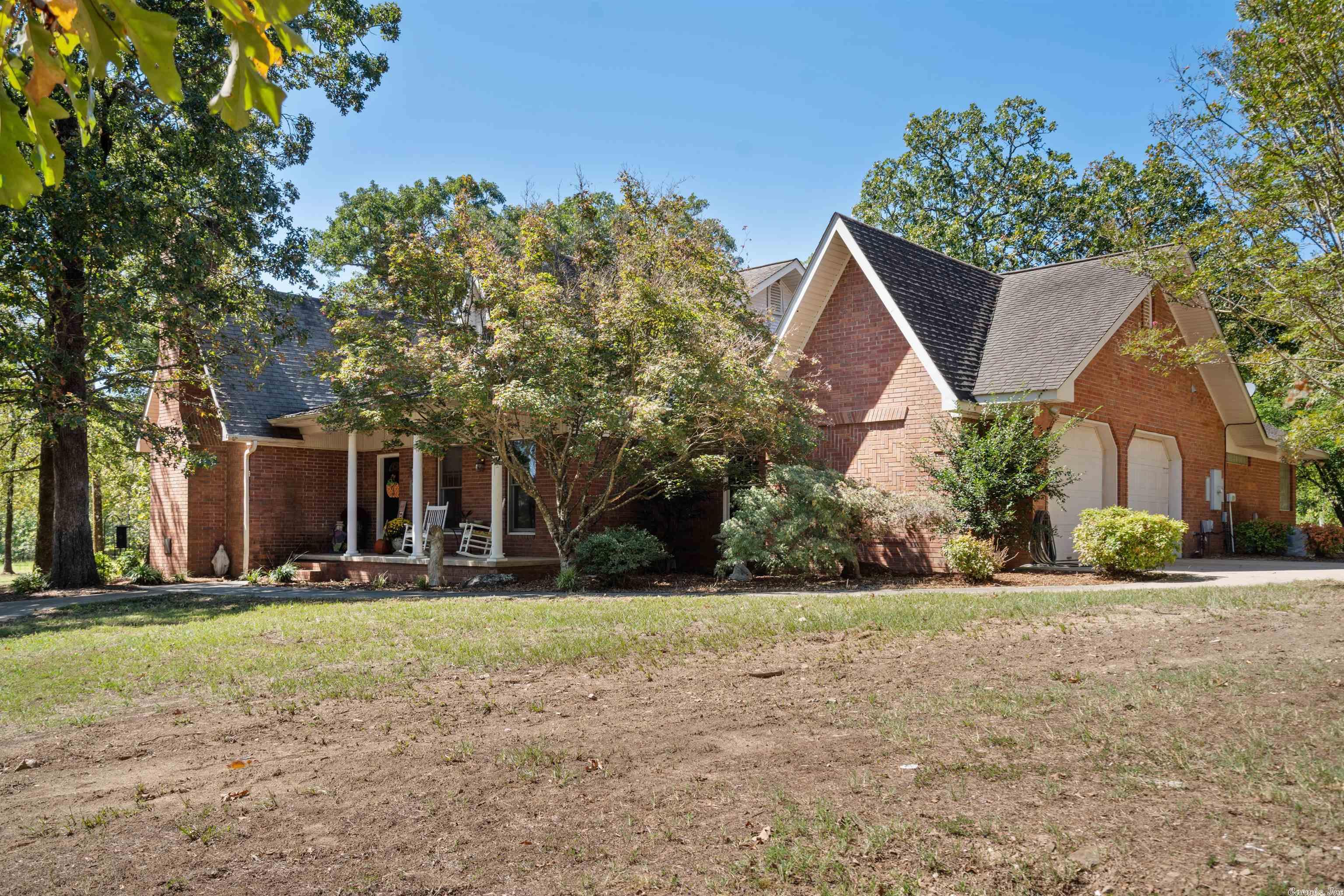 Looking for PARADISE? You have found it! One level almost 3500 sqft home, showcasing 2 LARGE master suites, open floor concept, separate den & separate dinning. Embrace the splendor of 60 acres of serenity, the sparkling pool relaxing and taking in the view under the gazebo, ALL less then 15 min from Oaklawn & Lake Ouachita. Unique Property Features include 2 ponds, surrounded by beautiful mountains, blueberry bushes, 3 Horse Stalls with a tack room, gated entrance, & chicken coop. Builder owned/built.