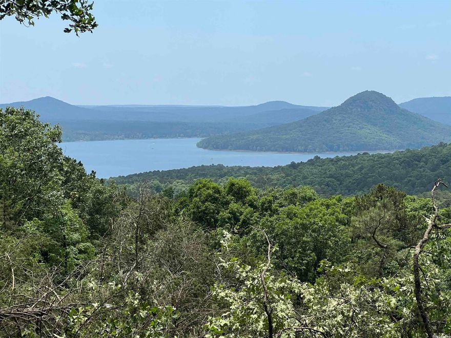 Stunning views of Sugarloaf Island and Greers Ferry Lake from this lot.  Very private.  Come build your dream home overlooking Greers Ferry Lake.  Just minutes to all the amenities of the Bay.  See attached survey in documents.