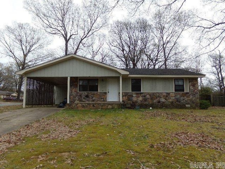 Nice ranch style home on a corner lot. It features 3 bedrooms, 1.5 bathrooms, fenced backyard, wood floors, fireplace. Currently leased. Home can be purchased individually or within a package of three (See MLS 23033302). Well maintained with records, selling as is-where is. Agents see remarks.