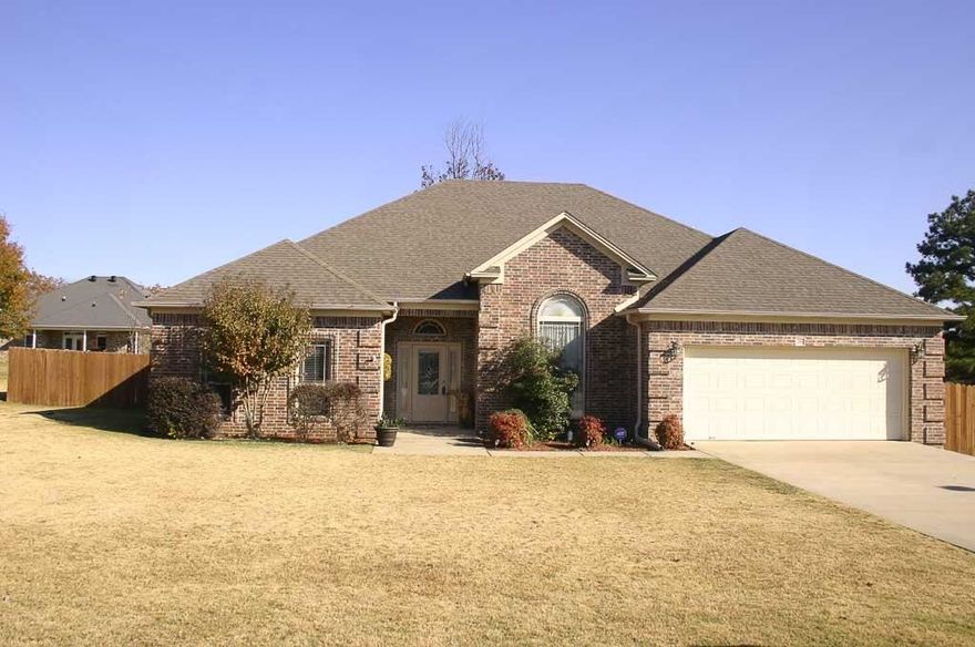 Gorgeous home in great subdivision w/ easy access to the freeway. This 4 br 2 bth home has everything! Eat in kitch features custom cab, stainless steal appliances, breakfast bar. Dining room has elaborate crown molding & high ceilings.  Lg greatroom has trey ceilings, gas fp, & gorgeous hand-scraped wood floors.  Huge master ste has trey ceilings & lg bth w/ jacuzzi, dbl vanity, sep shower, & walk-in closet.  Back yard is great for entertaining w/ 2 tier deck, 30 ft above ground salt water pool, & stg bldg