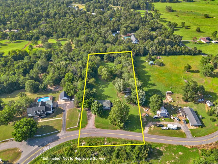 This well-maintained 2-bedroom 2 bath home sits on a scenic 2-acre lot atop Crow Mountain, offering peace, privacy, and potential. Perfect as a starter home or investment property, this all-electric residence features laminate flooring throughout and a cozy wood burning fireplace for year-round comfort.  The kitchen comes equipped with well-kept appliances that convey. Enjoy a spacious backyard-ideal for gatherings, gardening, or simply relaxing under the open sky. If you're looking for your first home, a weekend retreat, or a smart investment, this property offers solid value in a beautiful setting. Property is being sold AS IS.