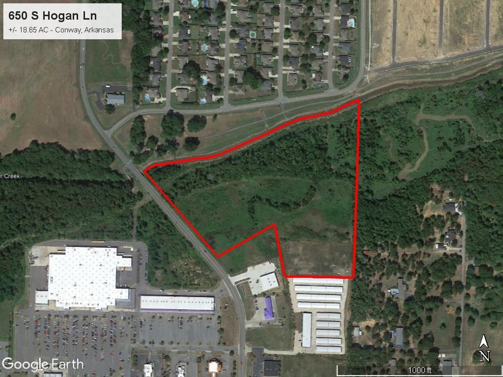 PRIME COMMERCIAL PROPERTY with great development potential. This 18.65 acre parcel of land is located in Conway Marketplace shopping center adjacent to Walmart and other retailers. It features road frontage with excellent visibility in a high-growth area of western Conway and is priced at $1,450,000. Mineral Rights do not convey.