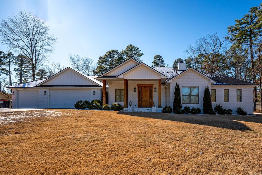 Stunning Home in Russellville-Your Dream Home Awaits.  Welcome to 1406 Skyline Vista Ct, where comfort meets elegance.  This beautiful 3-bedroom, 2.5-bathroom home offers modern comfort and stylish living in the heart of Russellville! Key features are: the spacious, open-concept living, dining and kitchen areas with gorgeous hardwood floors, the large kitchen island with a soft ice machine, granite countertops, and stainless steel appliances, the primary suite and spa-like ensuite bathroom, two additional spacious bedrooms with walk-in closets, the cozy fireplace and large windows letting in an abundance of natural light, the private backyard with covered patio-ideal for relaxing or hosting gatherings, and the attached 3-car garage with and abundance of storage-perfect for vehicles, tools, and hobbies. All of this is located in a quiet neighborhood, close to local schools, shopping and outdoor recreation. Don't miss this one! Schedule your showing today!