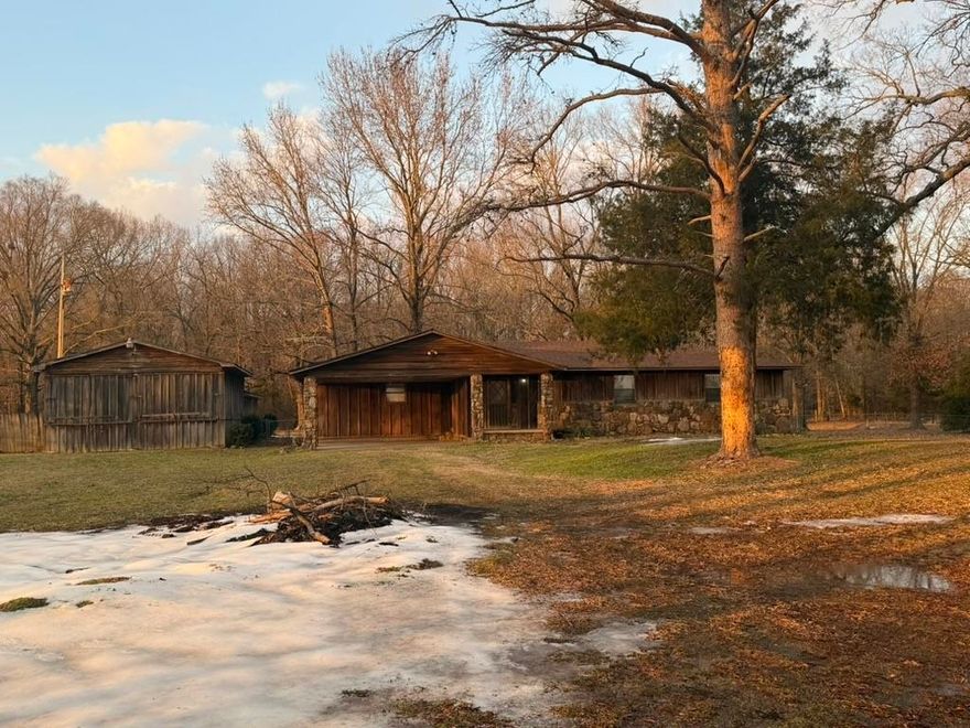 3/2 bath home with shop.