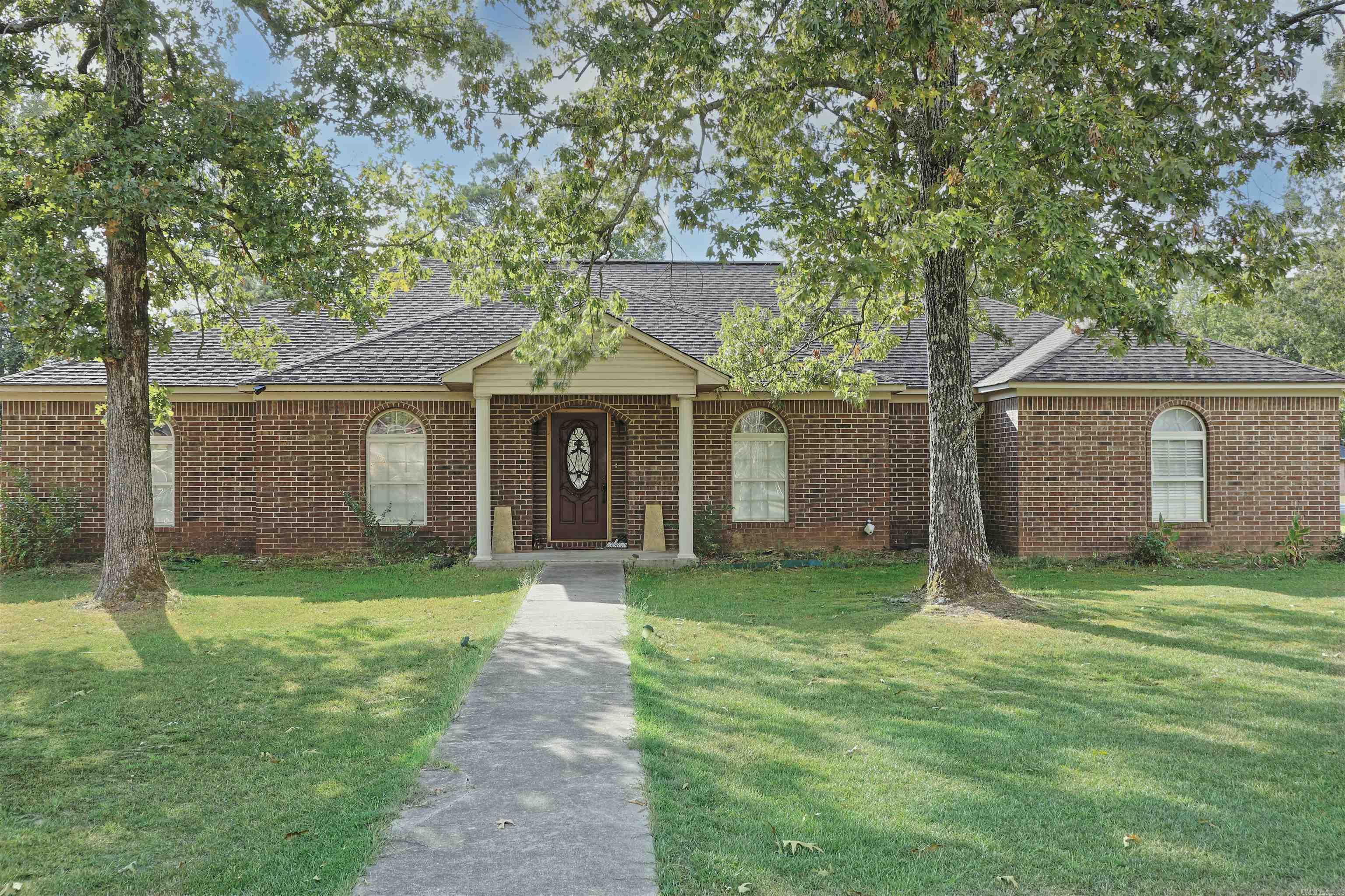 Beautiful home situated on a large corner lot! Welcome to this beautifully maintained 3-bedroom, 2-bathroom home featuring a large open floor plan perfect for both everyday living and entertaining. Thoughtfully designed with a split floor plan, this home offers privacy for the oversized master suite while keeping spacious guest rooms tucked away on the opposite side. Inside, you’ll find a formal dining room, a formal sitting area/office, a cozy breakfast nook, and a fireplace that anchors the main living space. The oversized master bedroom boasts a walk-in closet and a private en-suite bath, while both guest rooms also offer generous space and storage. The laundry room includes a utility sink and additional storage, and the double car garage provides convenience and functionality. Additional features include a partially floored attic for storage, and a new HVAC system (installed approx. 2 years ago). Enjoy outdoor living in the fully fenced, large yard situated on a desirable corner lot, offering space, privacy, and plenty of potential for a garden, pool, or play area. Rural Development eligible – potential for $0 down financing! Don’t miss your chance to see this one in person!
