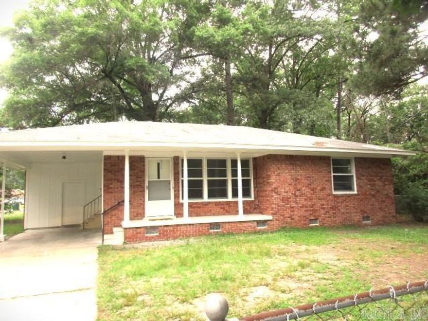 This adorable brick home is move in ready!!!  It is on a fenced corner lot.  2 bedrooms and 1 bath.  Many updates like new paint, new light fixtures and ceiling fans, new floor coverings.  Stove hook up is for gas or electric. This home has an exterior storage building in backyard.  Taxes are before Homestead Credit.  Call me and lets take a look and see if this is your new home!!