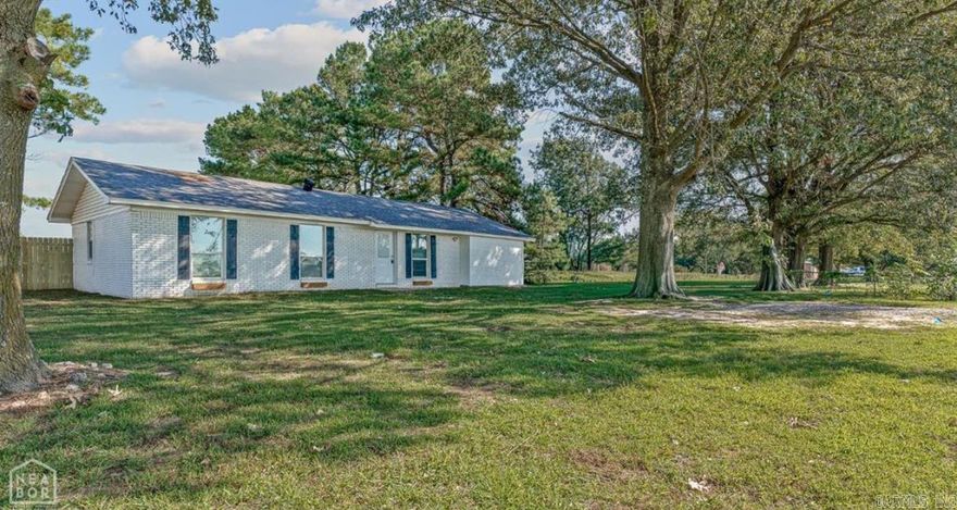 Check out this newly revamped 4 bedroom 2 bathroom home with a shop.