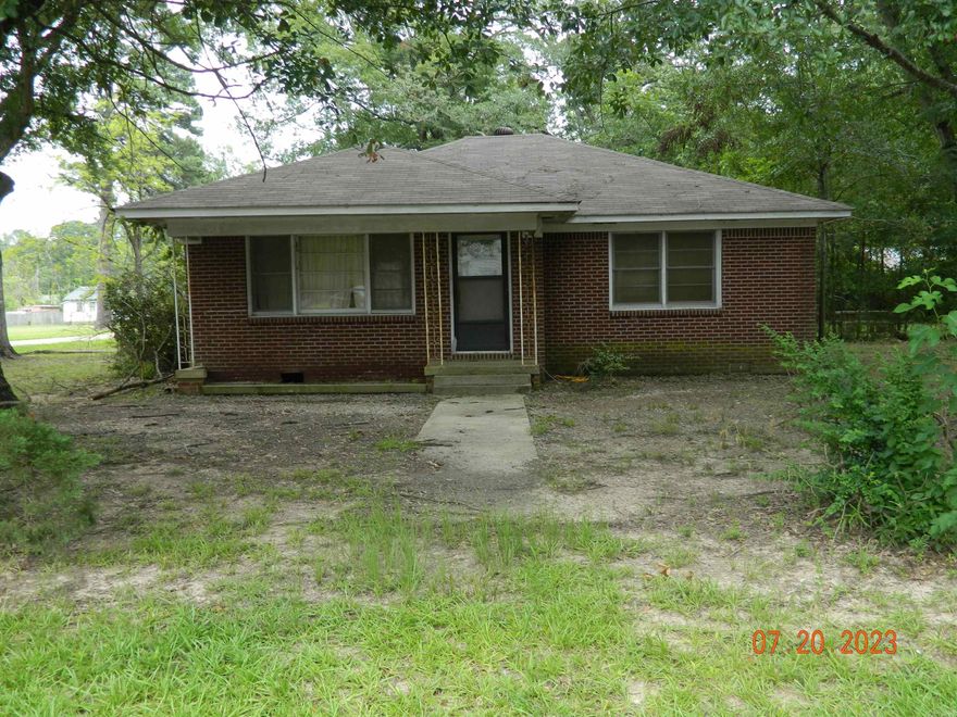 Nice Corner Lot , Beautiful  Oak  shade trees,  2 bedroom 1 Bath.  Cute Brick Home, Needs Lots of TLC, Show off your Workmanship on this fixer upper. House is Being SOLD AS IS. House can be shown Starting August 8th.