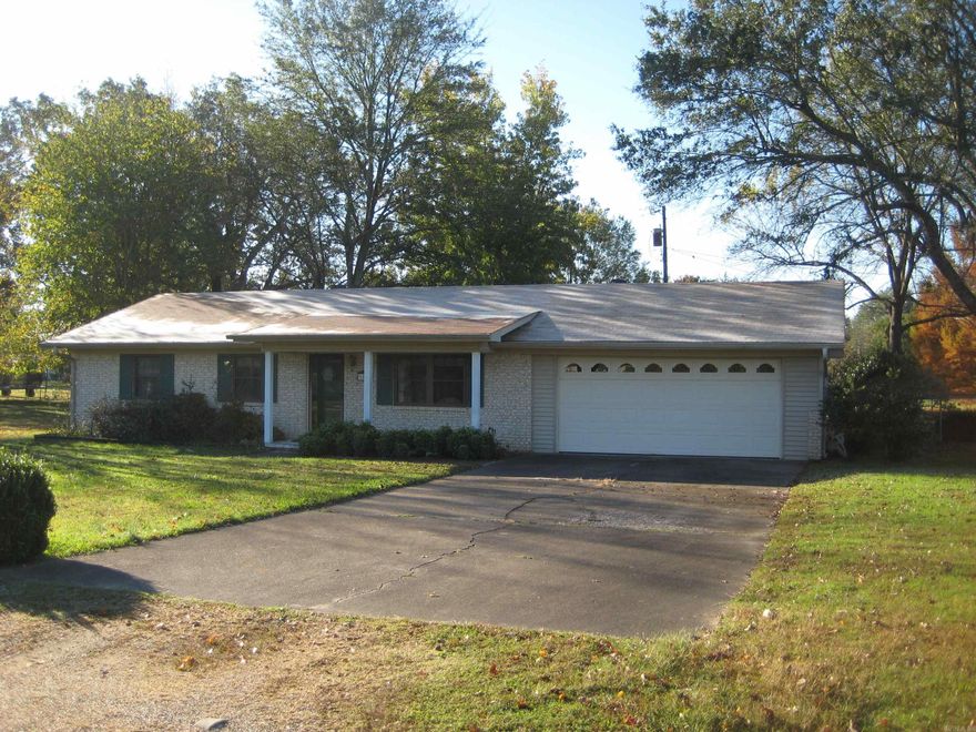 Beautiful 3 bed, 2 bath brick home in a nice subdivision. CH/A.  Utility room has sink and comes with a dryer.   New appliances and new floor covering in 2022.  Large covered patio with fenced backyard.  New roof 2021. Oversized garage with storage room.  Large lot with shade trees.  See agent remarks.