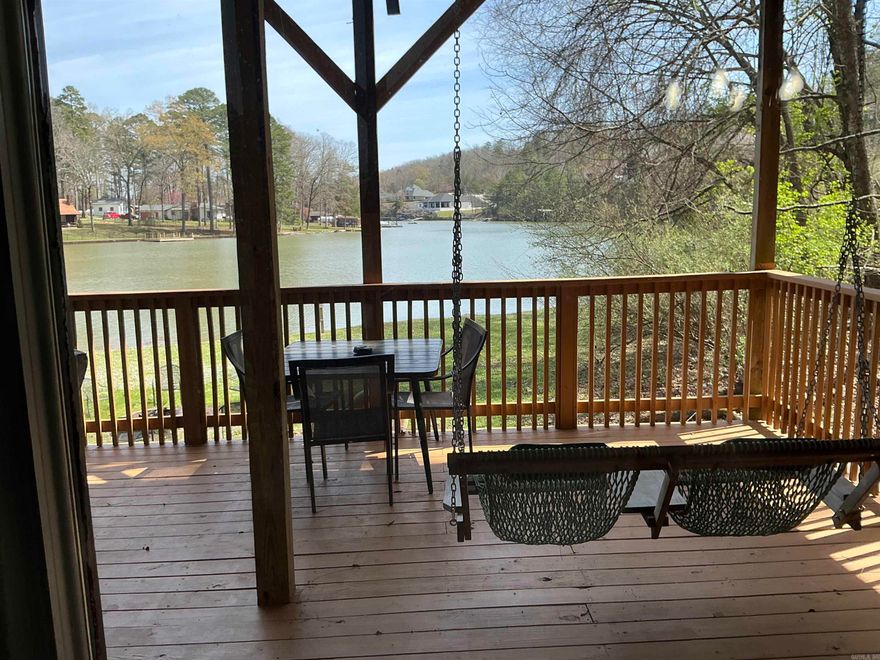 The coolest house in Hot Springs! This stunning tri-level Lake Hamilton waterfront home offers approximately 3,900±- square feet with plenty of room for everyone. Currently operating as an active 5-star, STR. The home has many bookings 2026 for immediate income sleeps up to 16 guests and presents an excellent opportunity for personal use, investment, or both. Comes FULLY FURNISHED!!!!  The home features 5 spacious bedrooms, including 4 with king beds and 1 with a queen bed, plus 3 rollaway twin beds for additional sleeping space. There are 3 full, oversized bathrooms, all thoughtfully furnished and equipped with the amenities guests and owners will appreciate.  Designed for comfort and entertaining, the layout includes huge rooms, 2 large wraparound decks, and a lower level with 2 generously sized bedrooms, a large laundry room, and an impressive game room complete with a pool table and foosball table.  This awesome waterfront home is being sold fully furnished, including indoor and outdoor furniture, making it truly move-in ready and turnkey.