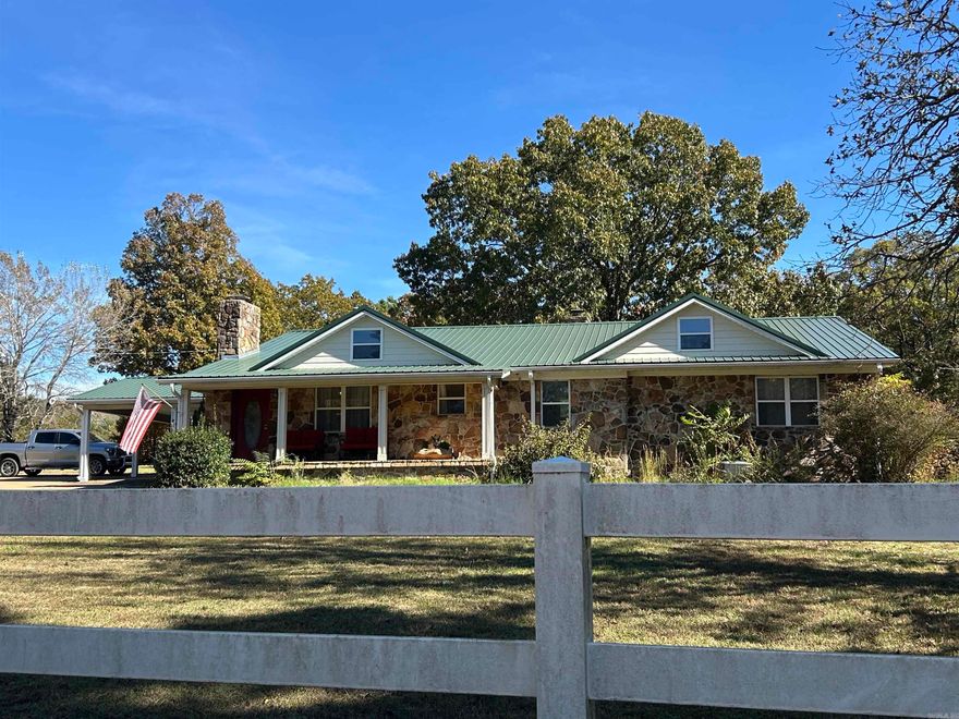 Your new home is located just a few minutes from downtown Mountain View, AR. This stunning One-of-a-Kind 3 Br-2 full bath custom home on 1.56 peaceful acres with solid oak and tile floors made to last the test of time! Beautiful rock accent walls and two stately stone fireplaces. Chef’s kitchen w/super large pantry, abundant counters and all appliances staying including upright freezer in utility room. Bright 14’x 25’ sunroom with large bay windows all across opens to an amazing 30’x35’ stone floor covered patio for outdoor entertainment- all with ceiling fans. Behind the front green acre is the metal red barn with newly developed 5 run animal kennel with 3,200 sqft running field under large oak. Runs have ramps into barn. So much storage available! Move in ready down to the custom curtains!  No repairs needed, incredible value! Come see this One-of- a-kind rural retreat today!