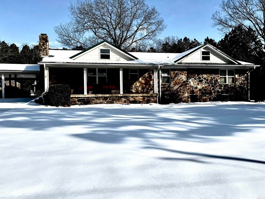 Your new home is located just a few minutes from downtown Mountain View, AR. This stunning One-of-a-Kind 3 Br-2 full bath custom home on 1.56 peaceful acres with solid oak and tile floors made to last the test of time! Beautiful rock accent walls and two stately stone fireplaces. Chef’s kitchen w/super large pantry, abundant counters and all appliances staying including upright freezer in utility room. Bright 14’x 25’ sunroom with large bay windows all across opens to an amazing 30’x35’ stone floor covered patio for outdoor entertainment- all with ceiling fans. Behind the front green acre is the metal red barn with newly developed 5 run animal kennel with 3,200 sqft running field under large oak. Runs have ramps into barn. So much storage available! Special Valentines gift for contract signed before end of January, 2026. All appliances including W/D, plus One Year Home Warranty at seller expense. Move in ready down to the custom curtains!  No repairs needed, incredible value! Come see this One-of- a-kind rural retreat today!