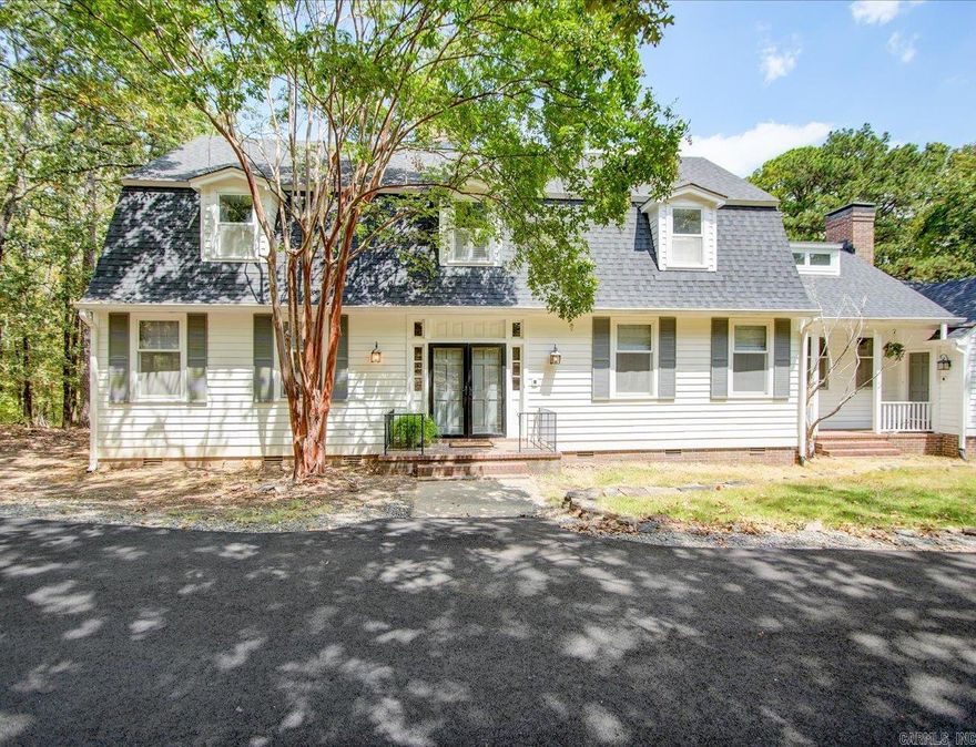 In a world full a chaos come home to this beautiful sanctuary with an abundance of woodland views.  If you are a nature enthusiast the Ouachita Trail is located across the road in the middle of the woods that runs parallel with Lake Maumelle. If you require a little rejuvenation at the end of the day take a dip in your inground pool, sit in the sauna or enjoy the view from your deck or sunroom.   Three woodburning fireplaces and two staircases for easy access throughout home.  Wet bar area comes with cabinetry and shelving.  Built ins throughout.   The owner has been busy maintaining the home.  2021-two new hot water heaters installed. 2023-pool was sandblasted, replastered automatic pool cover installed, 2023-2025 three ac/furnace units replaced, 2025-roof replaced, driveway paved and garage doors replaced. Workshop/she shed comes with a greenhouse space.  Three car garage has its own covered patio with storage loft for all of your out of season necessities.  Designated fenced area for playground.   More amenities that you will have to appreciate when you book your private showing.