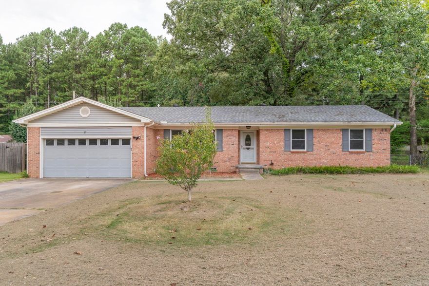 Great Sherwood location! This updated 4-bedroom, 2-bath home is move-in ready. The living room features a cozy fireplace, and the primary bedroom includes an en-suite bathroom. Recent updates throughout! New paint, new fixtures, new flooring, new kitchen and new baths! Outside, you’ll find a storage shed and an attached 2-car garage. Solid brick construction and modern improvements make this a great option for families or investors. No seller property disclosure.
