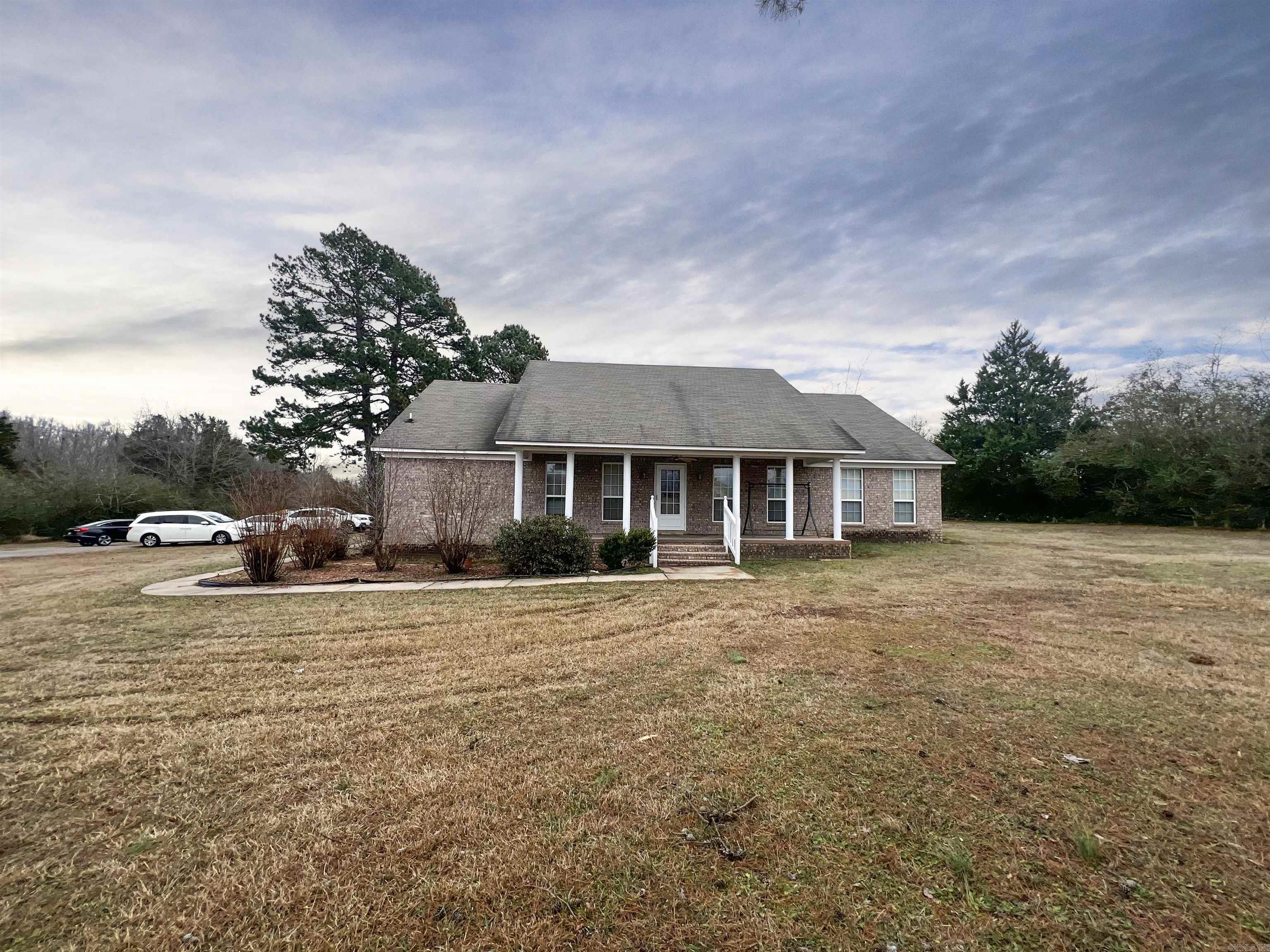 Country living with endless potential! 3BR/2BA on 2 acres.  Escape to the sounds of the outdoors with this charming 3BR/2BA home situated on 2 acres of land.  This property offers tranquility with plenty of room to spread out, garden, or simply enjoy nature. The functional layout and great bones is just waiting for your personal touch.  Transform this hidden gem into your dream country retreat with lots of opportunity for you to determine the vibe - cozy farmhouse, country haven - you decide bc possibilities are unlimited.  Very large rooms throughout and ready for your design ideas! Covered oversized porches for your swing, bonus area over garage waiting to be finished so you can design your space, part of back yard is fenced, utility room is spacious - just so much to offer! A short drive through the Wooster country charm is all it takes to find this home ready to bring your vision to life.   Agents see remarks