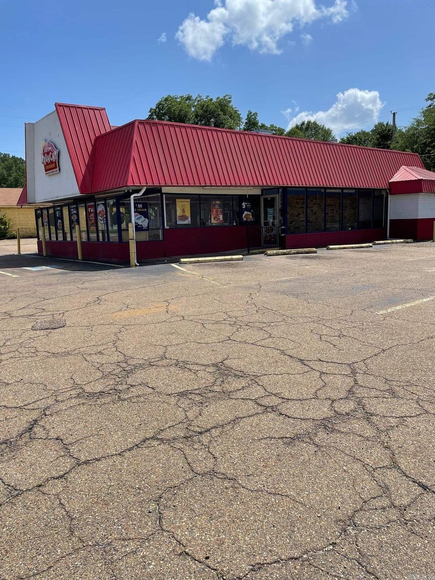 Building and lot for sale. Best use - restaurant. Located on a corner.