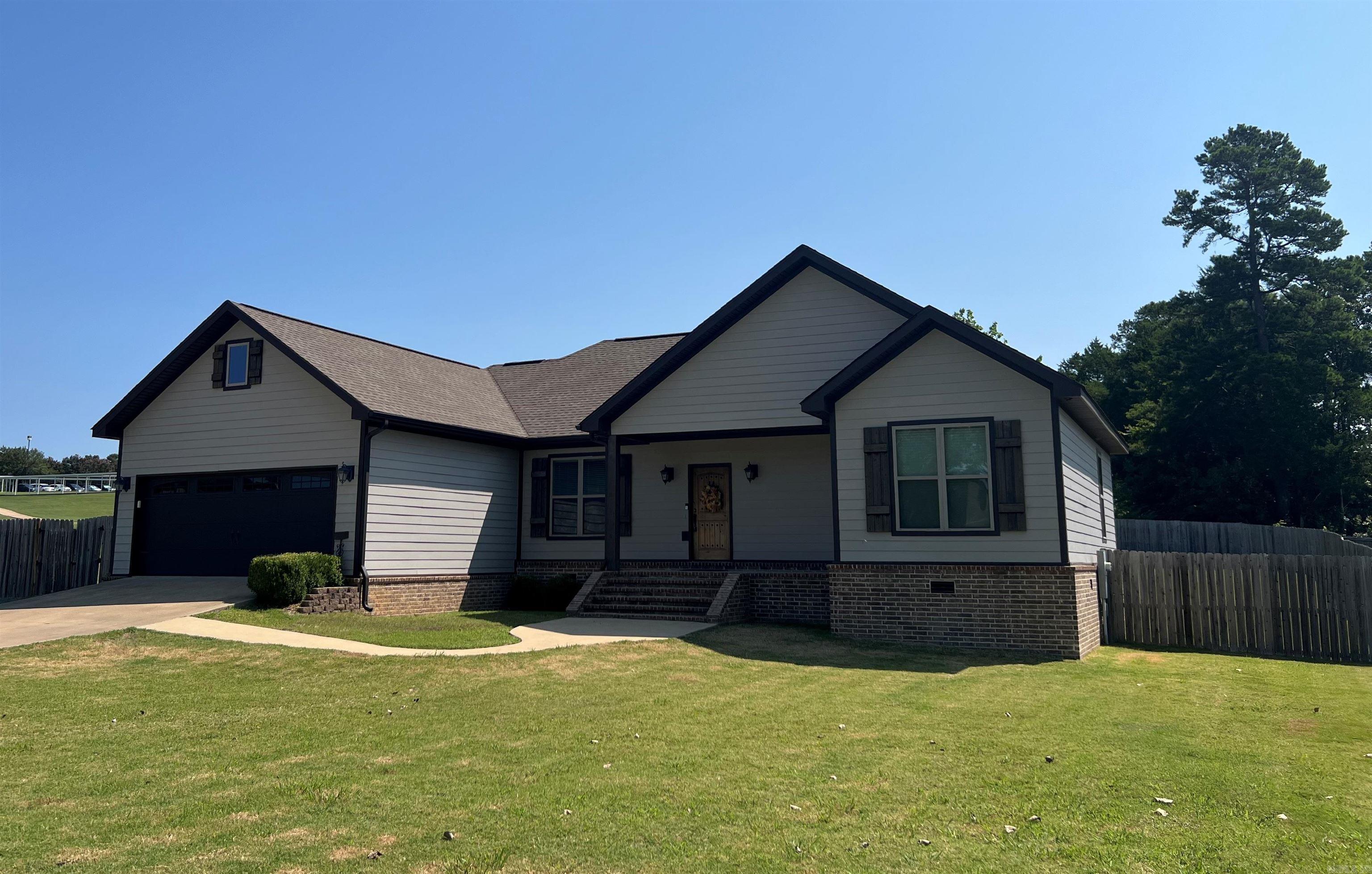 LITERALLY NEXT TO EVERYTHING! Located close to Eagle Mtn. School, Walmart, restaurants and shopping! This kitchen has a WOW factor and all of the stainless appliances are included! Enjoy an OPEN FLOOR PLAN where you can cook in the kitchen and not miss a thing going on in the living room! You'll need large furniture to fill the primary bedroom that is on the opposite side of the house from the other 2 bedrooms. And just wait until you see the amazing walk-in closets! Bath off the primary bedroom has double vanities and a partially enclosed tiled shower. The deck is shaded all afternoon making it perfect for outdoor cooking and entertaining! Choose your own flooring for the main living area with a $7,000 allowance provided by the Seller! HURRY, this one will go FAST!