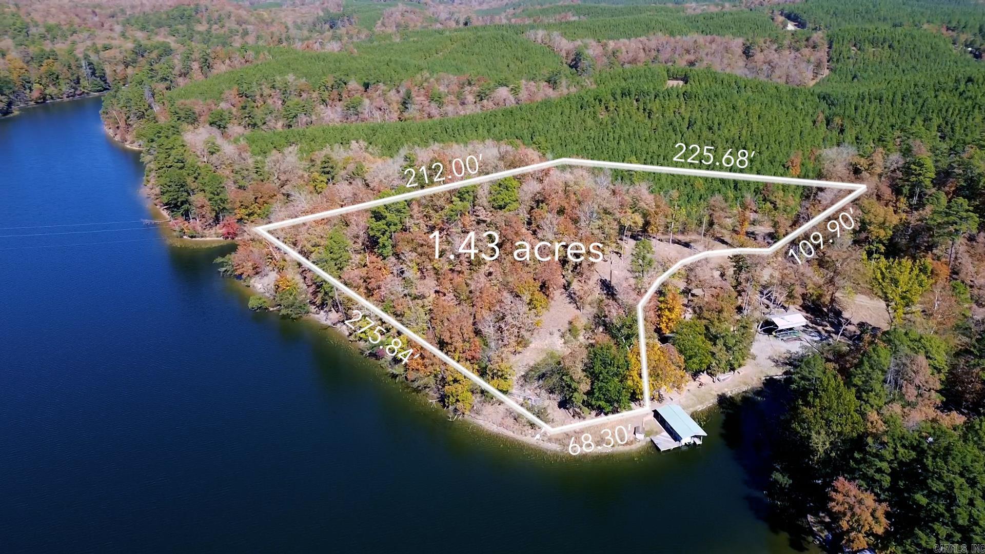 You found the perfect location for your new Lake Front Property. Over 300ft of lake frontage. Find your retreat soaking in the peacefulness of Lake Norrell. Lake Norrell is a hidden treasure in Saline County. Live Lake life only 30-35 minutes from town.