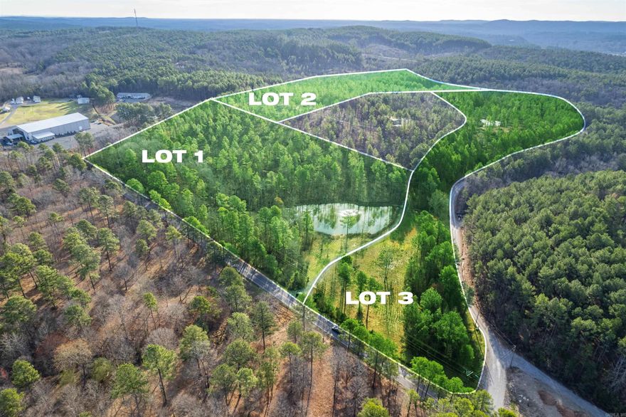 Awesome opportunity to own acreage with a pond just off Highway 7 with easy access to Hot Springs Village and Hot Springs! Call today for your private showing of this gem! For your custom home, city water and natural gas may be available, Electric nearby, and will require septic. Adjoining additional acreage available! Lot 2 is 9.29 acres and Lot 3 is 8.63 for a total potential of 30+- Photos shown are of all 3 lots.
