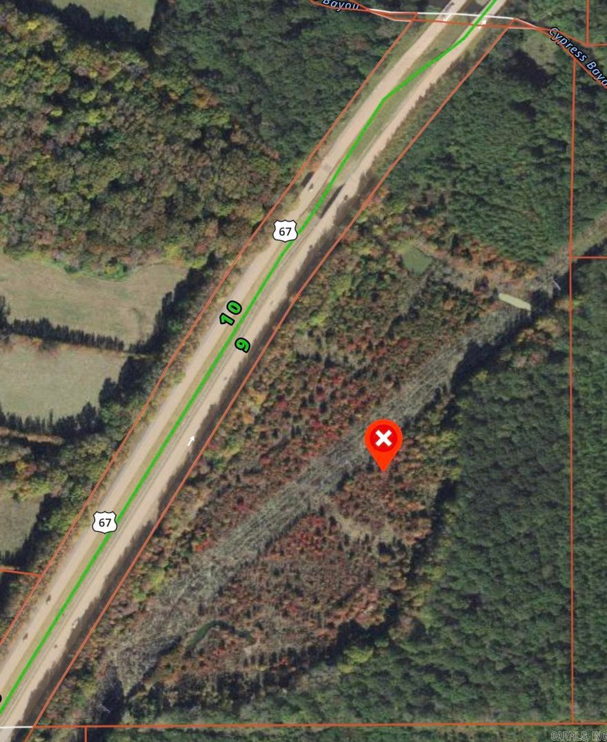 Discover a rare opportunity within the vast expanse of this 36-acre vacant land, offering a blank canvas brimming with potential for a dream home location or a development opportunity. With over 2300 feet of frontage on Highway 67 or access from the city roads, this property holds the promise of diverse possibilities waiting to be harnessed.  This land invites you to fulfill your dreams – whether it's crafting a private sanctuary, developing a new subdivision, or housing your hunting club.  Call to show today!