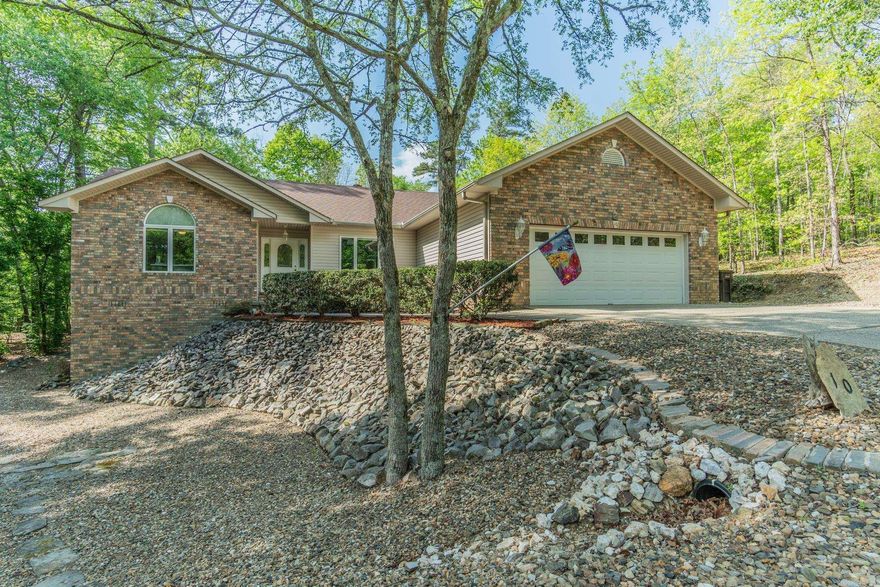 Beautifully remodeled home on private lot. Features include Luxury vinyl flooring in living areas. Tile in Sunroom and bathrooms. Freshly painted throughout interior and popcorn ceilings removed. All New light fixtures and ceiling fans. Vaulted ceiling in Living room and kitchen. Skylights for natural light. Kitchen has been re-done with Quartz counters, Kohler farm sink, all New Minard's kitchen cabinets with soft close and roll out shelves. New cooktop, wall oven and microwave. Primary bedroom has new carpet and a tray ceiling. Primary bath has jetted tub and walk-in shower. 2nd bedroom also has a vaulted ceiling. Out back there is a spacious Deck for outdoor entertaining. Also, with a fenced in area for the pets in the back yard. There is also a spacious Workshop beneath the home for all of your hobby's. AGENTS SEE AGENT REMARKS!