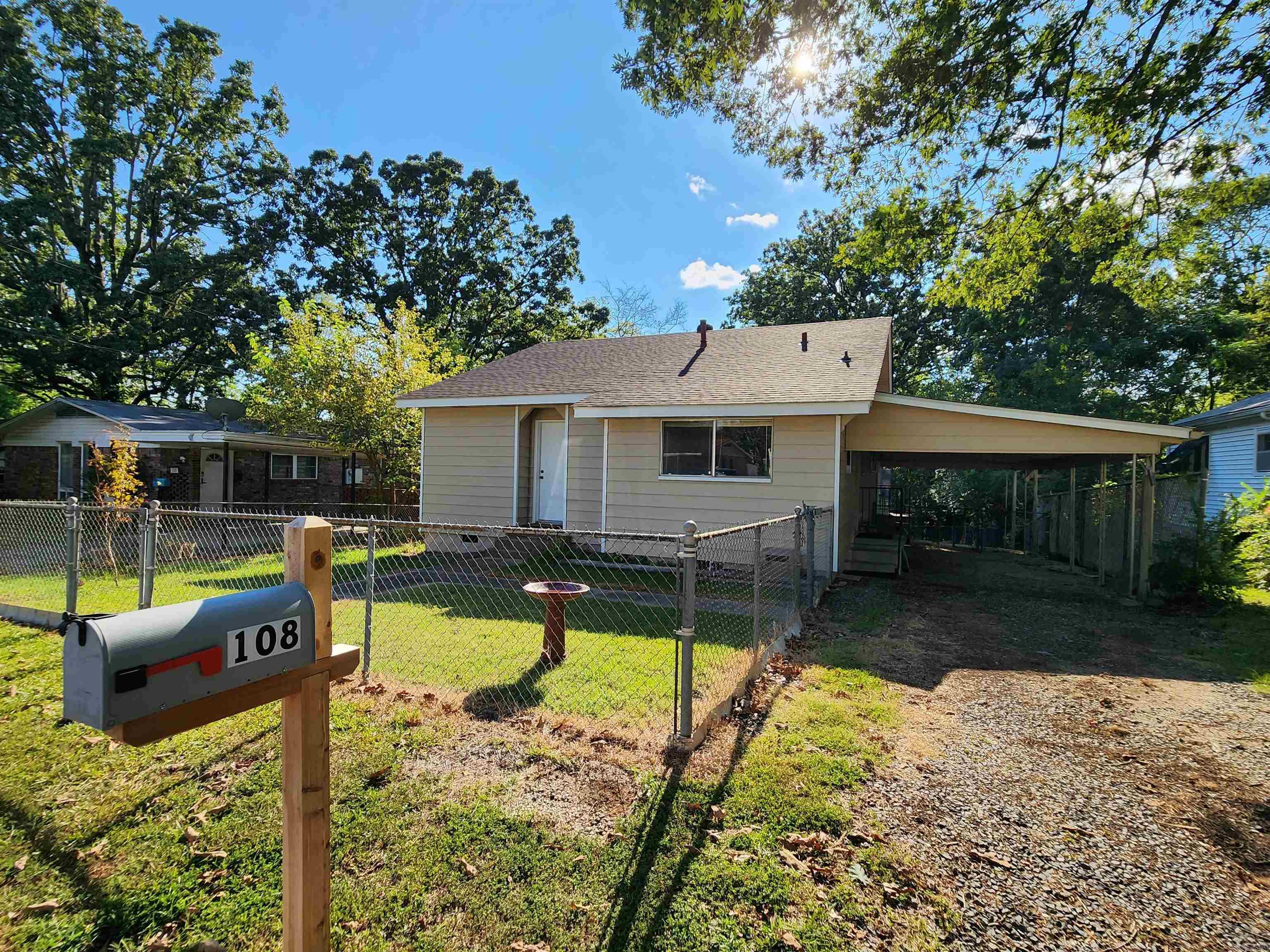 Cute City Home with Real Hardwood Flooring, Big Laundry Room, Fully Fenced w/separate backyard fencing, Roofs updated with Architectural shingles (June 2025), Freshly Painted exterior, Lots of Storage inside and outside, Two Outdoor Storage/Shops attached to house 15x18 and 10x16 and an additional 10x20 Metal Storage/Shop.
